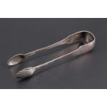 A pair of George III Scottish silver sugar tongs with shell terminals, Alexander Henderson,