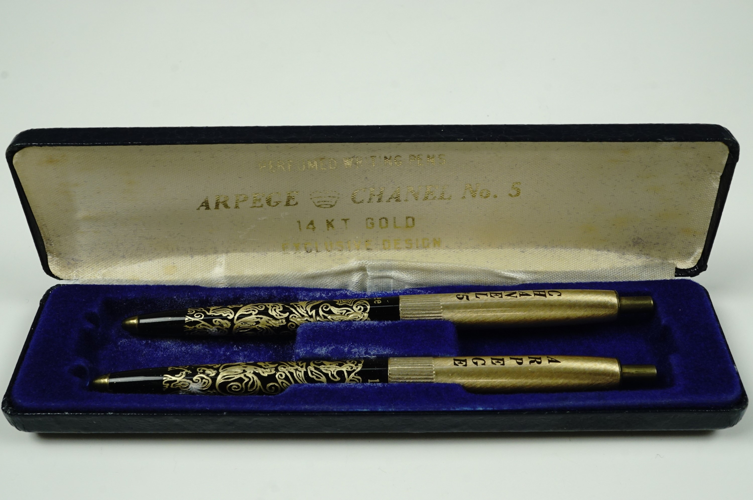 An "Arpege Chanel No 5 perfumed writing pens" cased pen set, circa 1970, [likely by the American