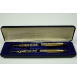 An "Arpege Chanel No 5 perfumed writing pens" cased pen set, circa 1970, [likely by the American