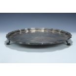A 1930s silver salver, having a Chippendale style rim and scroll feet, Roberts & Belk, 30 cm, approx