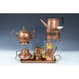 A four piece copper tea set together with two similar kettles and a copper kettle stand