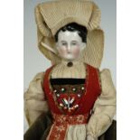 A Victorian porcelain articulated doll in Swiss costume