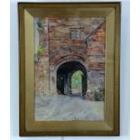 C C Crompton The abbey gateway, Carlisle, watercolour, signed and dated 1924, gilt pencil frame