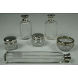 Two silver lidded glass perfume bottles, two silver lidded glass pots, a silver lidded glass