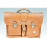 A vintage leather brief case, 45 cm wide