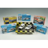 Four boxed Vanguard's diecast models, comprising police cars, and 'Yorkshire Tea', and Corgi limited