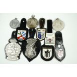 10 European police breast badges on leather fobs