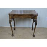 An old reproduction George I influenced walnut turn-over-top games table, 71 x 40 x 75 cm