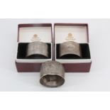 A pair of silver napkin rings by Mappin & Webb Ltd, London, 1963, in original cartons, together with