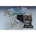 A box file containing an eclectic assortment of philatelic material, including a mint 1933 centenary