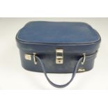 A 1970s Pixie travel vanity case in blue leatherette, 30 cm x 32 cm excluding handle