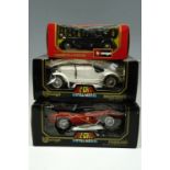 Two boxed Burago die cast 1/18 scale model cars including Mercedes Benz SSK (1928) and a Ferrari 250