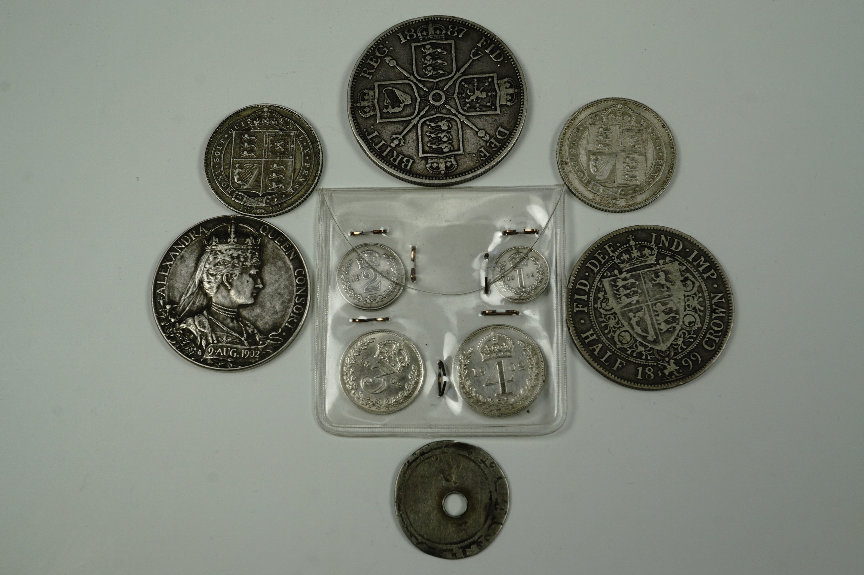A 1902 Maundy set together with a 1902 coronation commemorative, sundry Victorian silver coins and - Image 2 of 2
