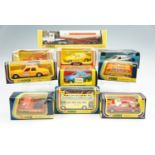 Ten boxed Corgi busses, an Esso tanker, Ford Sierra etc