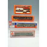A quantity of Hornby 00 gauge model railways including boxed locomotives, rolling stock, a tunnel,
