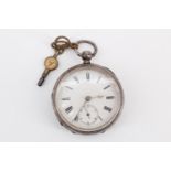 A Victorian silver cased pocket watch, having a white face with Roman numerals and subsidiary