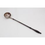 A George III silver toddy ladle, the bowl of plain form and having a slender turned wooden handle,