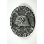 A German Third Reich silver wound badge, bearing the "30" mark indicative of Hauptmünzamt of Vienna