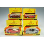 Four boxed Shell Classic Sports Car Collection die-cast toy cars including a BMW M1 and a Porsche