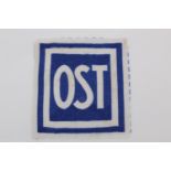 A German Third Reich Eastern forced labour Ostabzeichen printed badge