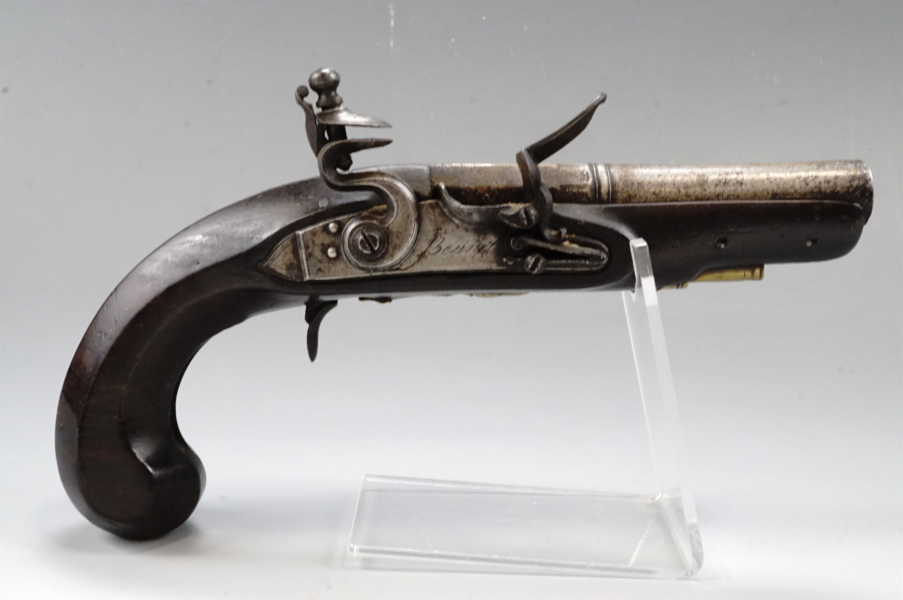 A George III flintlock travelling or overcoat pistol by Bennett of London, having a 4 1/4 inch