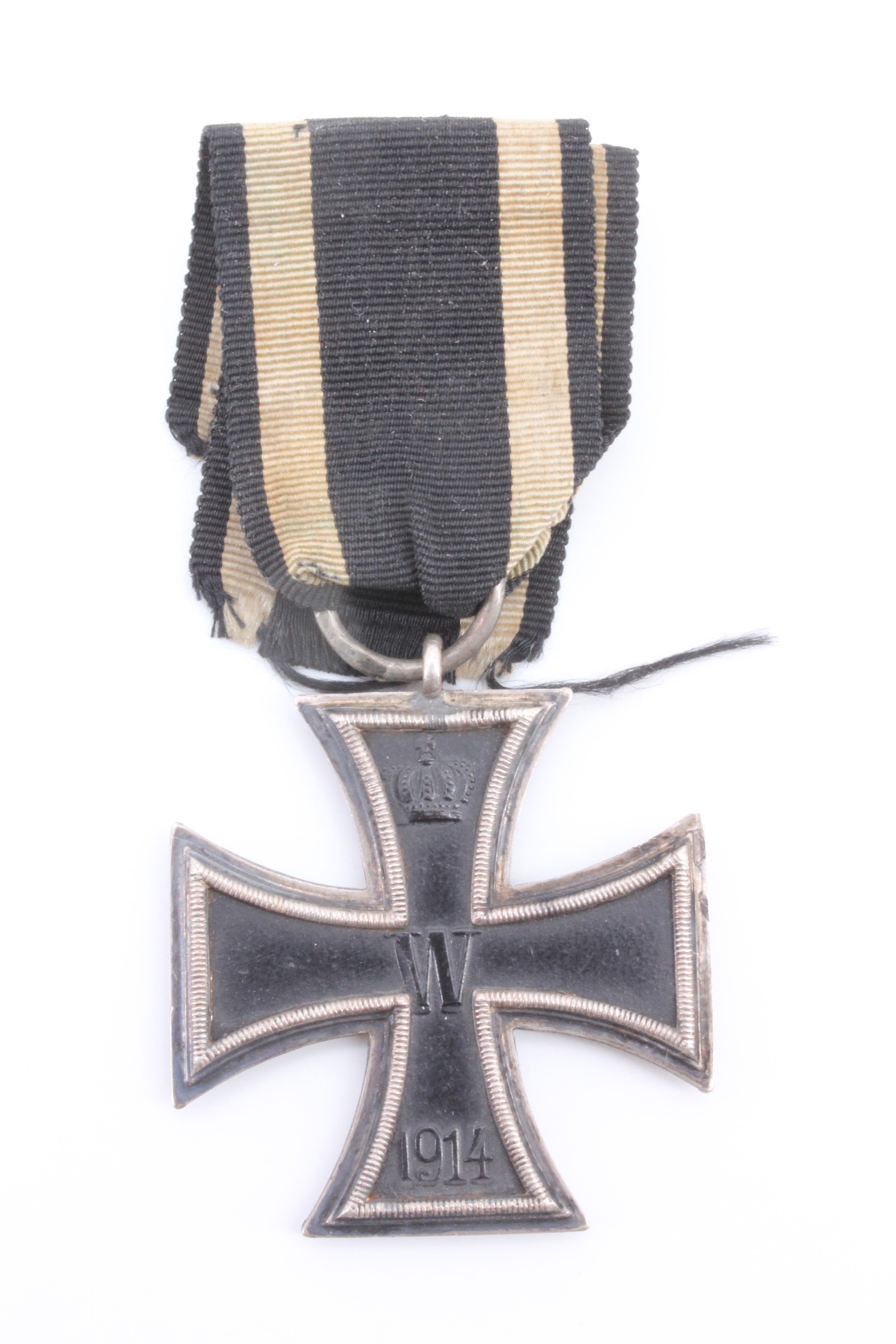 An Imperial German 1914 Iron Cross second class, its ring stamped with indistinct initials and an
