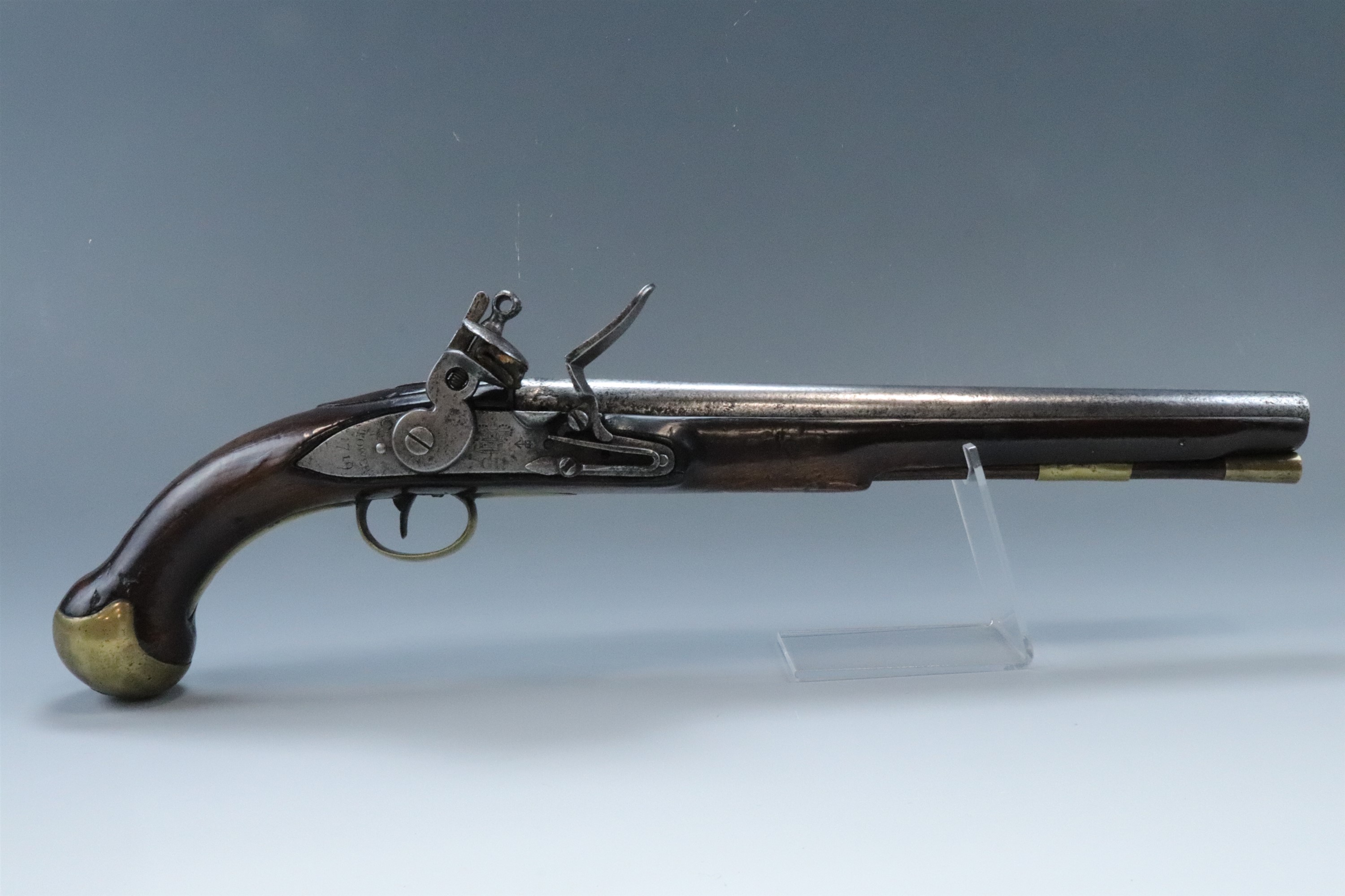 An extremely early Tower flintlock Sea Service pistol, the lock plate dated 1719