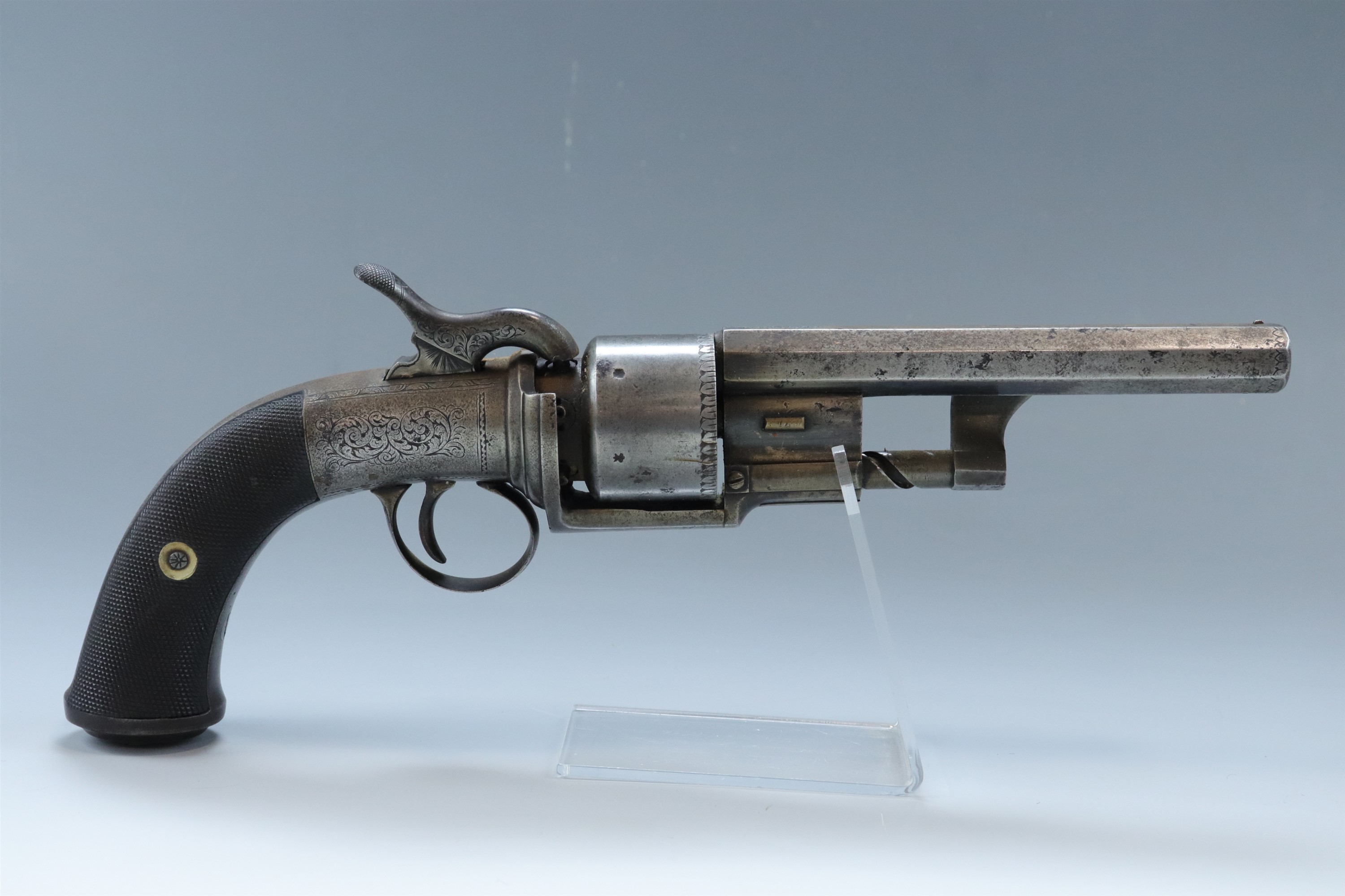 An English transitional revolver, circa 1840, having a rifled 5 1/2 inch octagonal barrel of