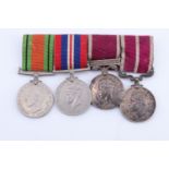 A George VI army long and meritorious service medal group, comprising Defence and War Medals, with