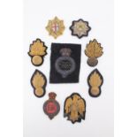 A quantity of Guards officers' bullion embroidered cap badges