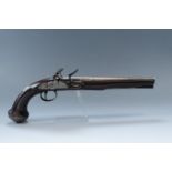 A George III white metal and iron mounted flintlock holster pistol by Ketland, having a 9 3/4 inch