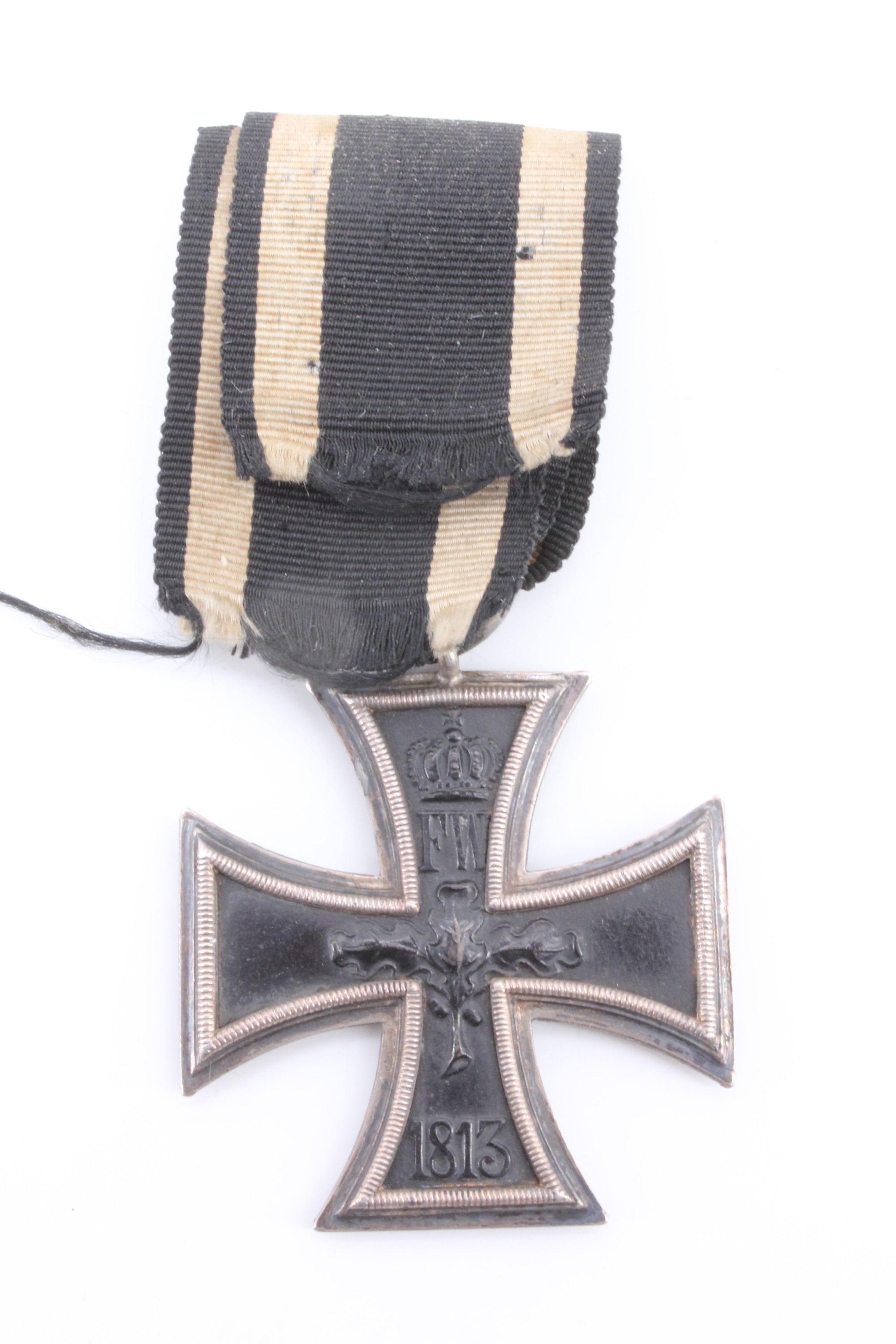 An Imperial German 1914 Iron Cross second class, its ring stamped with indistinct initials and an - Image 2 of 2