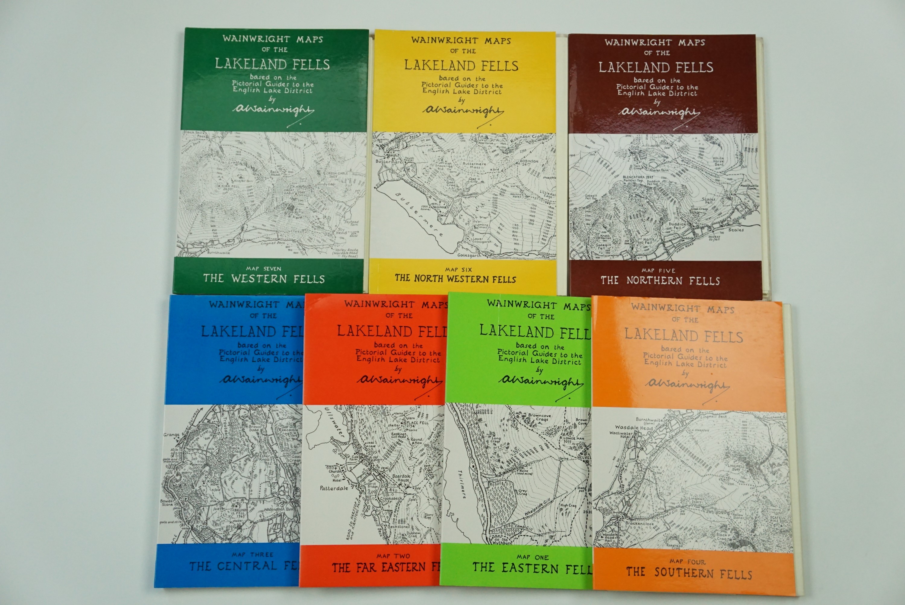 A set of seven folded maps relating to each of the areas featured in A Wainwright's guides,