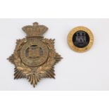 A Victorian Dorsetshire Regiment officer's Home Service pattern helmet plate centre together with an