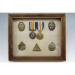British War and Victory medals and related cap and other badges pertaining to 1611 Worker Dorothy