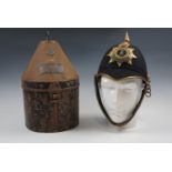 A post 1901 Green Howards officer's Home Service pattern helmet, in Japanned tine bearing a brass