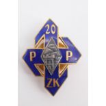 A Polish 20th Infantry Regiment badge, numbered 295