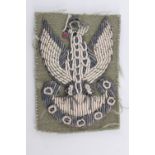 A Free Polish Army bullion embroidered cap badge