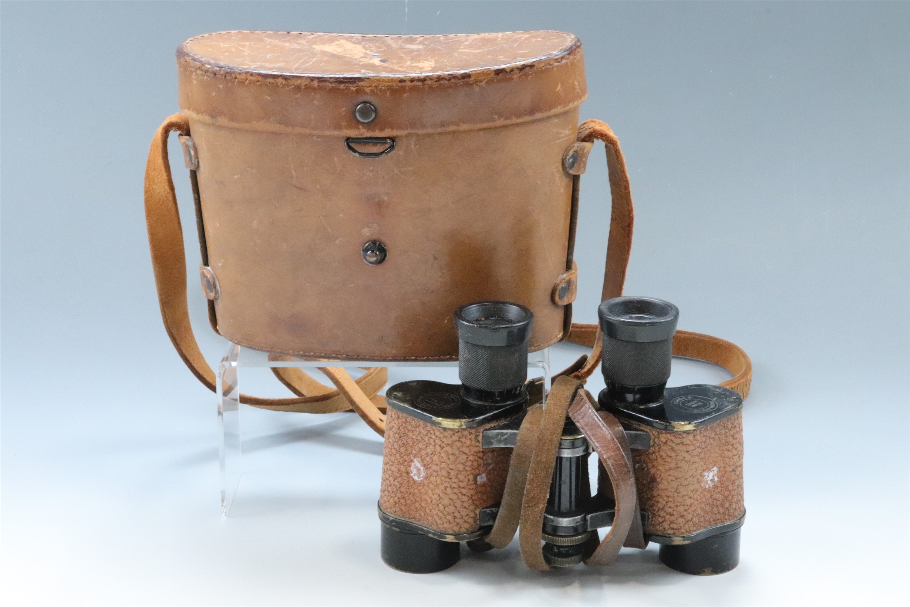 A cased set of US Army Signal Corps Bausch and Lomb prismatic binoculars bearing RAF / Air