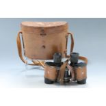 A cased set of US Army Signal Corps Bausch and Lomb prismatic binoculars bearing RAF / Air