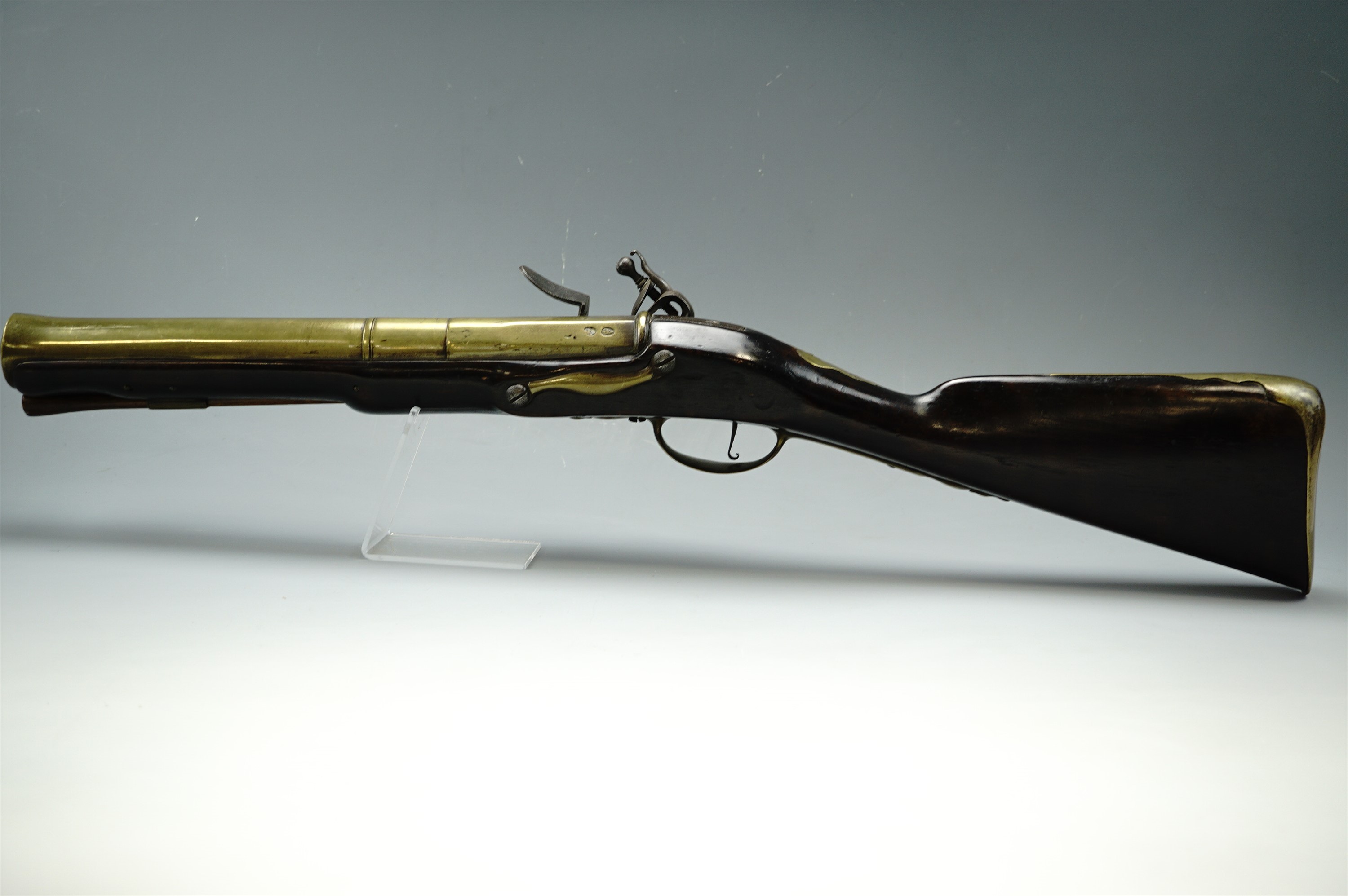 A flintlock blunderbuss by Dolep of London, having a three-sage brass barrel, polygonal at the - Image 7 of 13