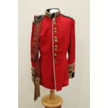 An early 20th Century Coldstream Guards Lieutenant's full dress tunic and waist sash