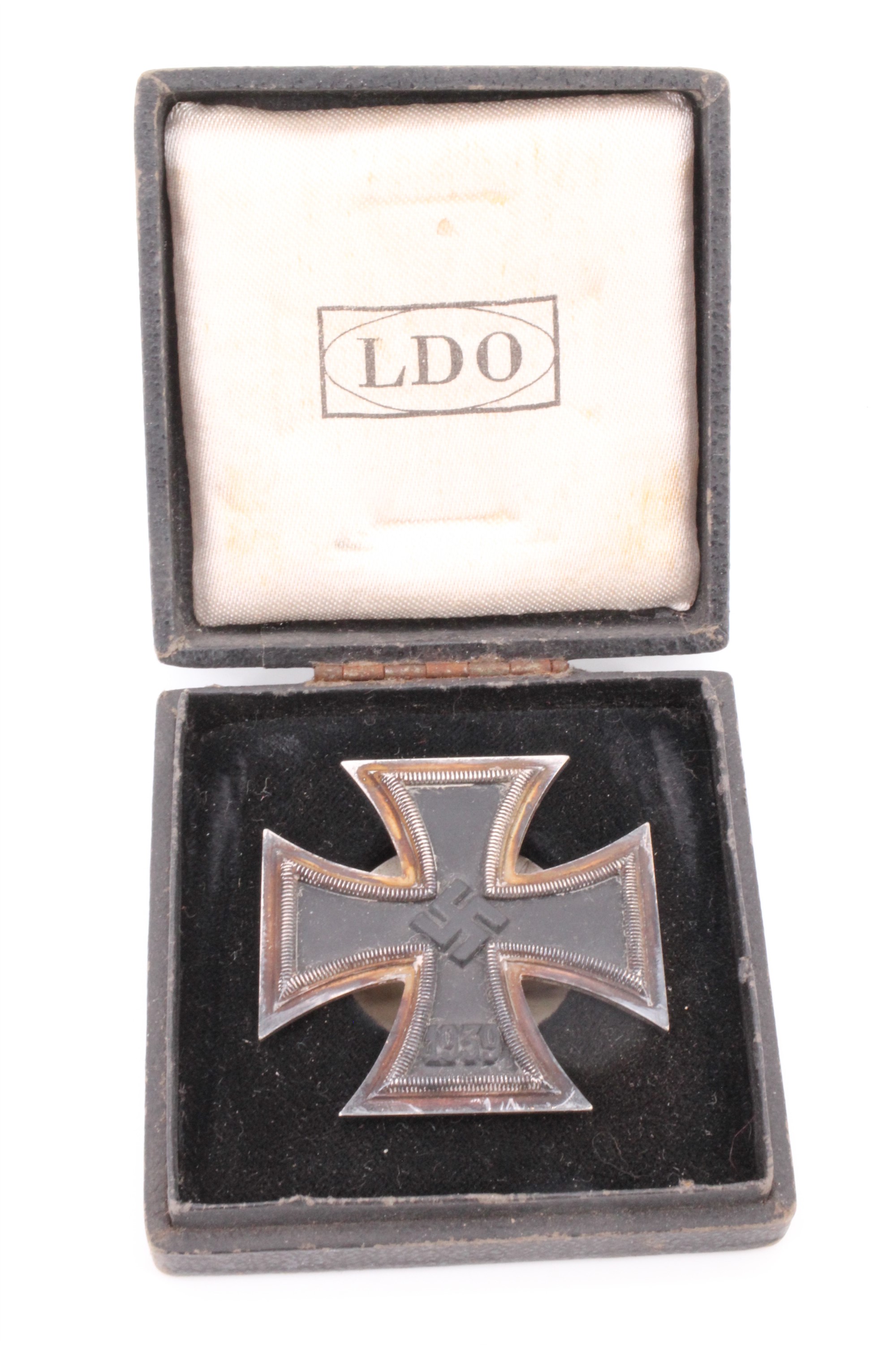 A German Third Reich cased Iron Cross first class, being a screw-backed variant stamped L/54