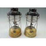 Two Tilley storm lanterns, 33 cm