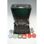An Imperial portable typewriter and ribbons B0017