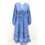 A 1970s padded cotton floral pattern "hippie" dress, label size L