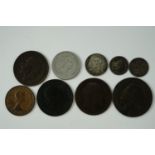 A small quantity of coins including a silver 1922 half crown