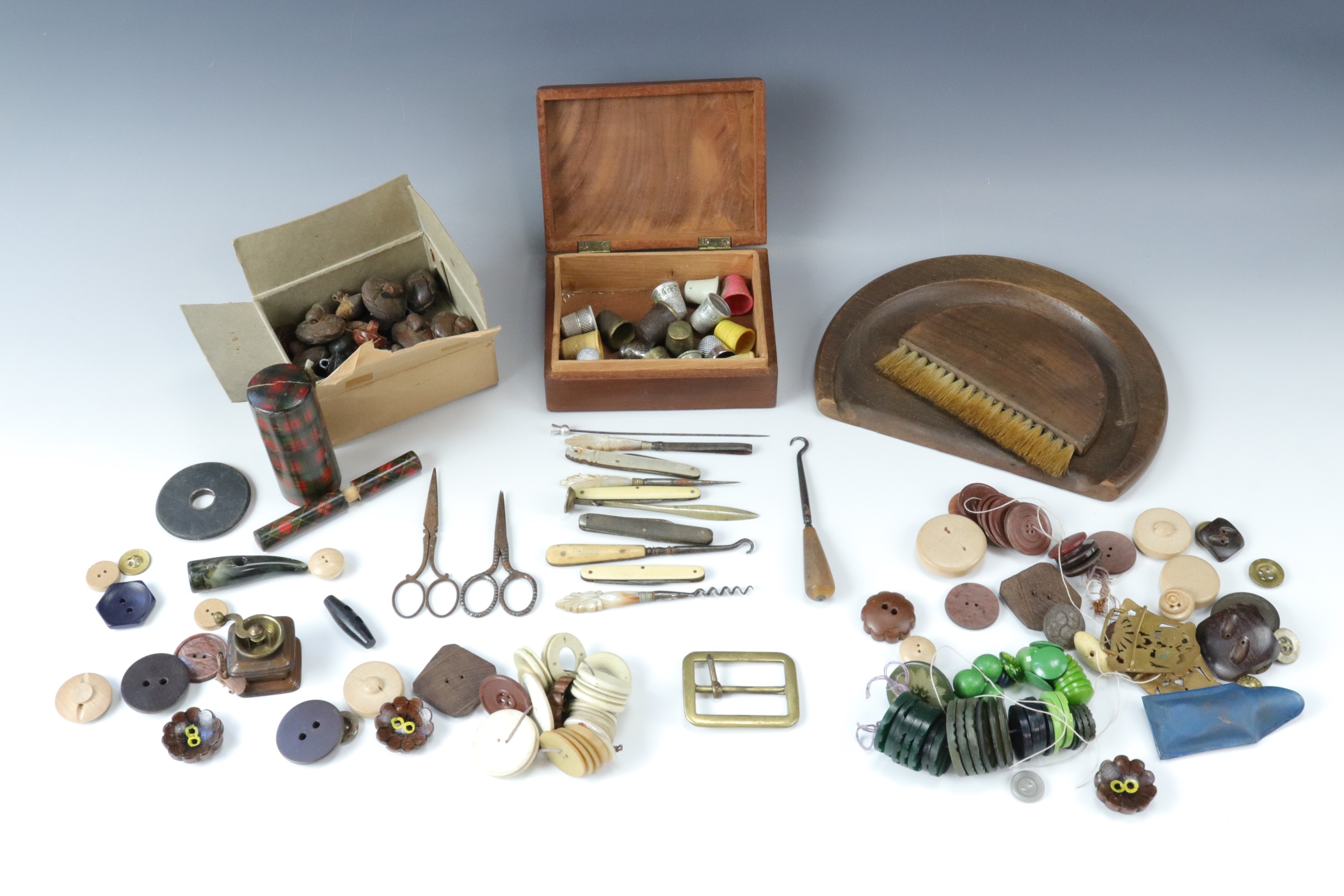 Sewing implements, buttons, crumb brush and tray