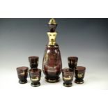 A Murano gilt-enriched amethyst glass liqueur set, circa 1960s, decanter 27 cm