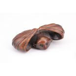 A Japanese carved wood netsuke of a bat, 5 cm